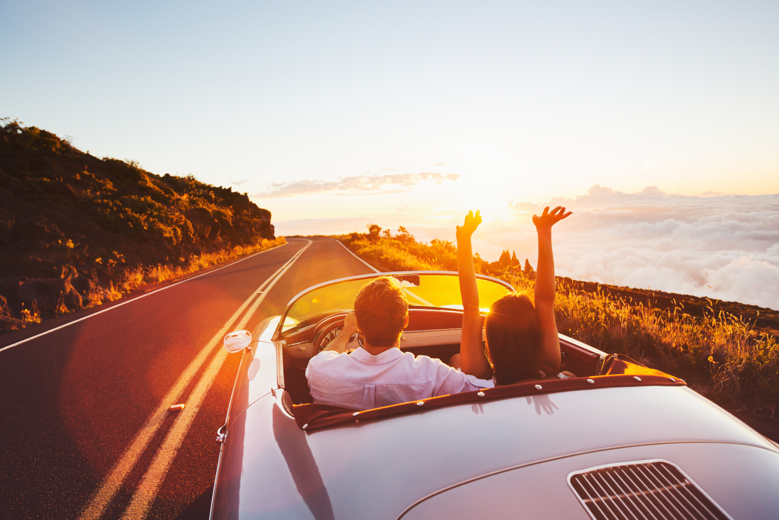 Happy couple in car