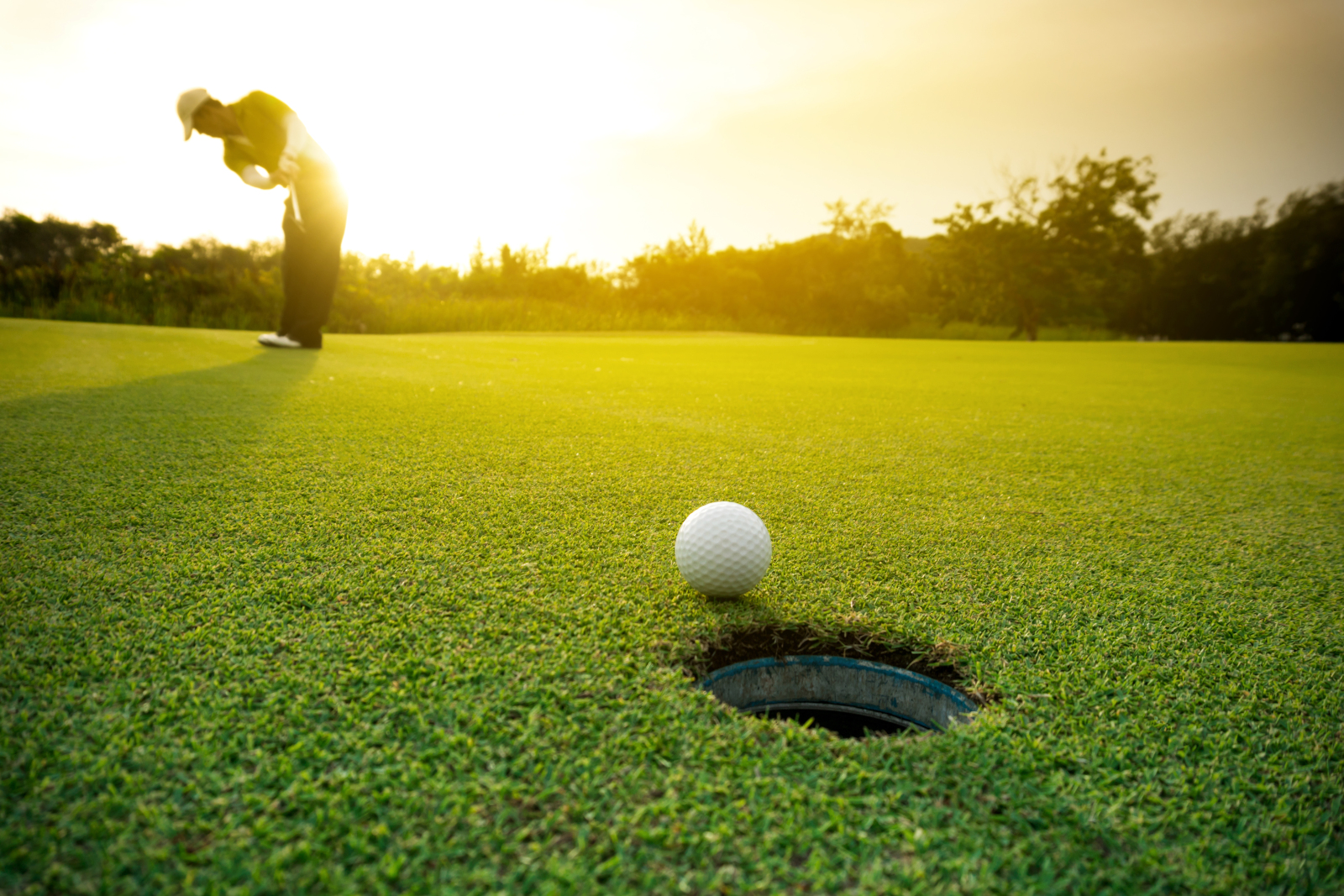 Golfer making a putt