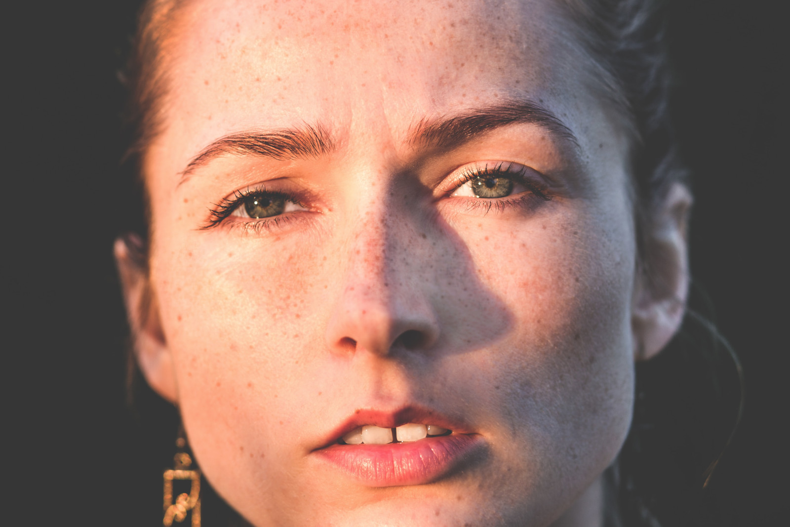 closeup of a girls face with worried look